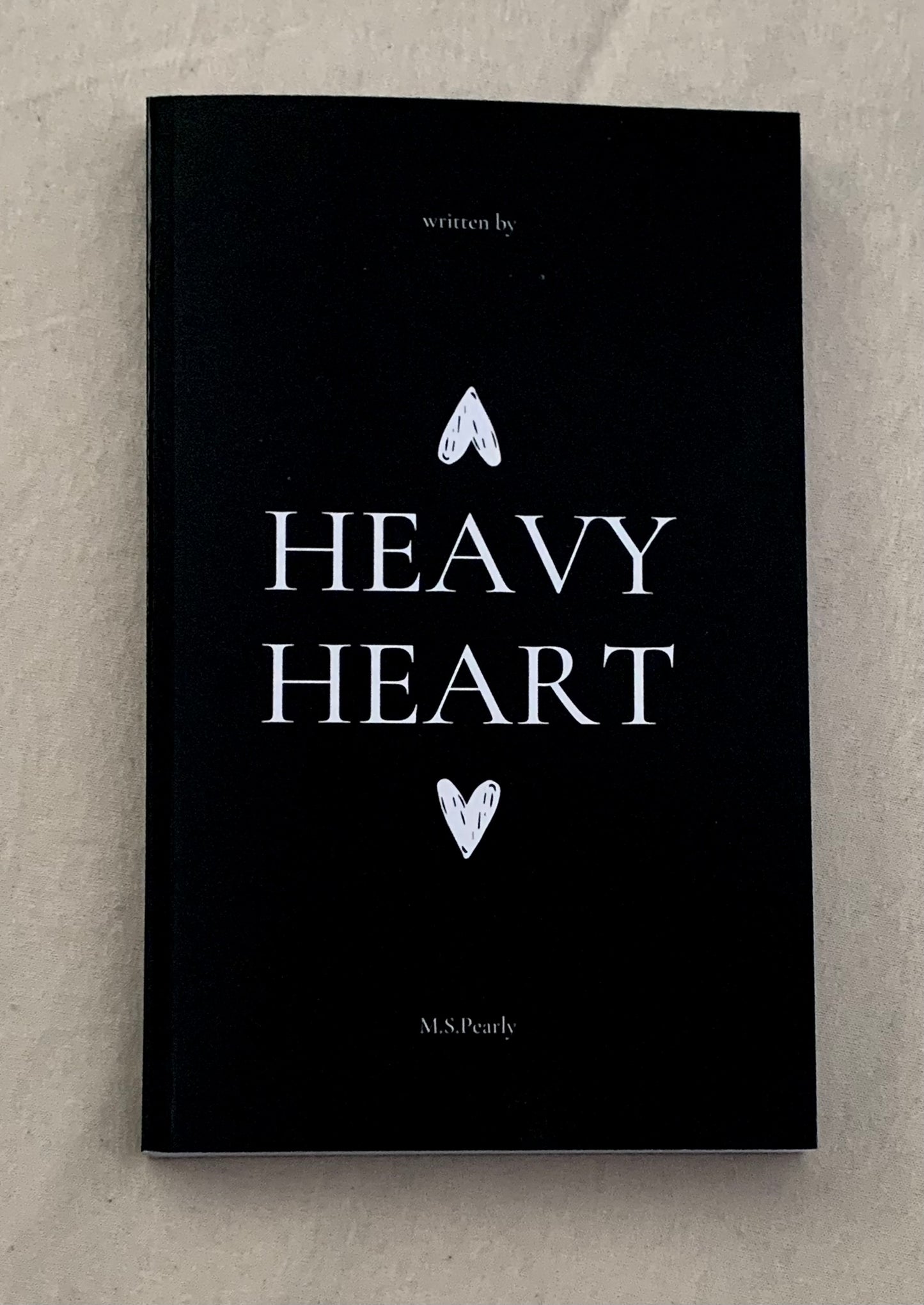 written by a HEAVY HEART - signed paperback